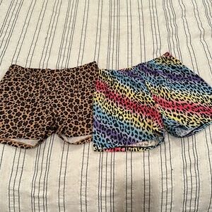 Two printed animal print biker shorts